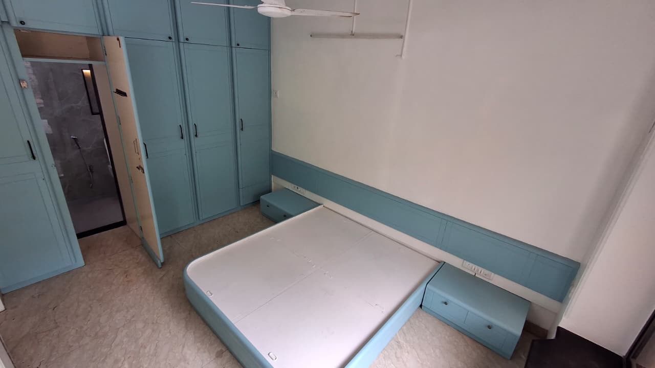 Bedroom with wardrobes and storage bed