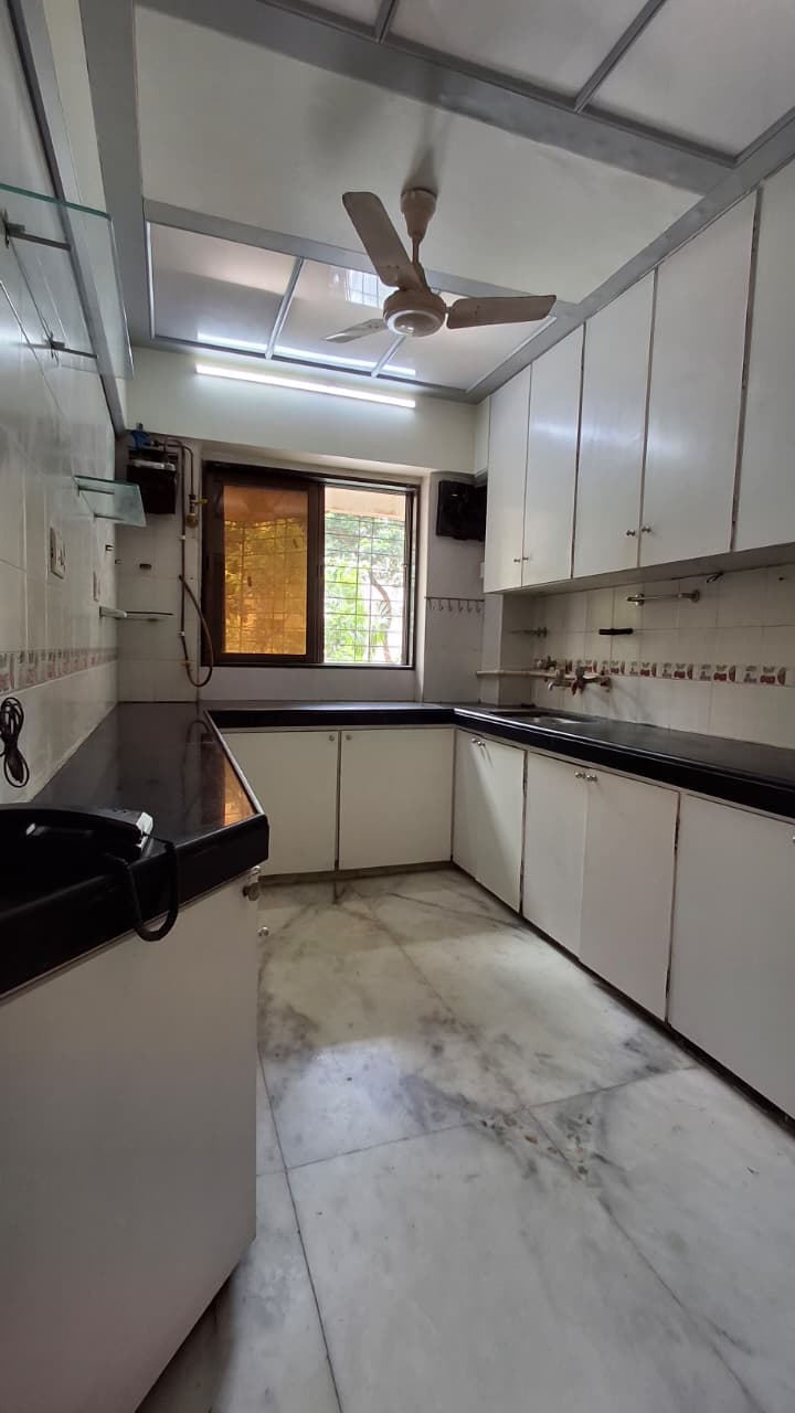 Kitchen with fitted cabinets